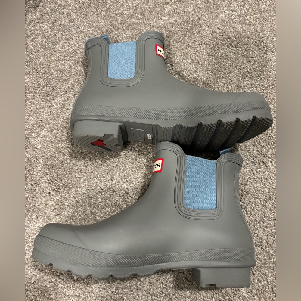 Hunter low rain boots.